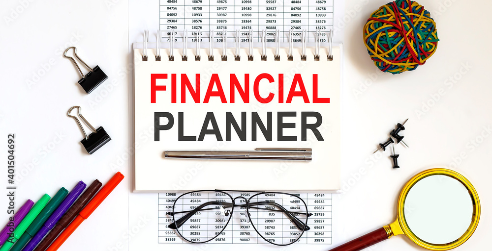 Poster notebook with tools and notes about financial planner