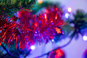 Christmas tree decorations with blurred background. Festive season. Indoors