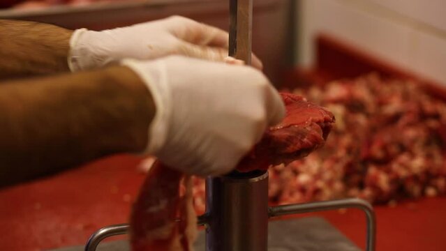 piling up and preparing doner at a traditional restaurant, uncooked meat