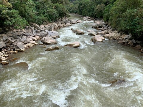 Stormy Urubamba river in Amazon drainage system, rising in Andes of southern Peru. White water rafting down Urubamba river incredible experience. Upstream called Vilcanota River. 