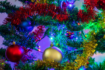 Christmas tree decorations with blurred background. Festive season. Indoors