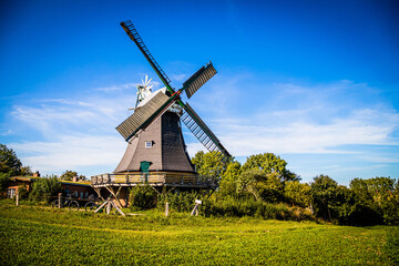 Plakat Historical windmill in Ascheberg at the Great Ploen lake in Schleswig-Holstein, Germany