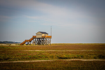 Fototapeta premium Old beach house near St. Peter Ording at the Northsea coast of Schleswig-Holstein, Germany