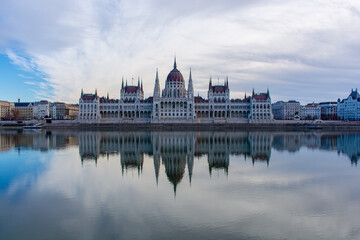 Fototapeta na wymiar Hungary, Budapest, Parliament on the banks of the Danube river, the reflection of the building in the water