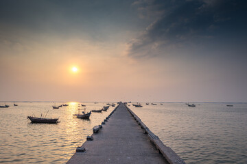 Sunset Over The Fishing Pier At The Lake In Thailand