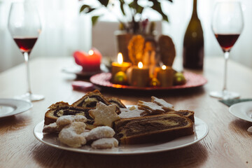 Cookies and drink leftovers on table, morning after Christmas