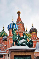 Fototapeta na wymiar Saint Basils cathedral and Monument to Minin and Pozharsky on the Red Square in Moscow. Popular landmark. Winter photo.