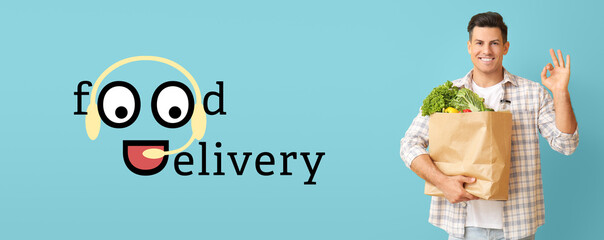 Male courier of food delivery service in medical mask on white background