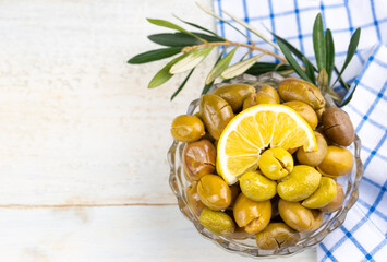 Cracked green olives. Cracked green olives with lemon. Turkish style olive (Turkish name; kirma zeytin)