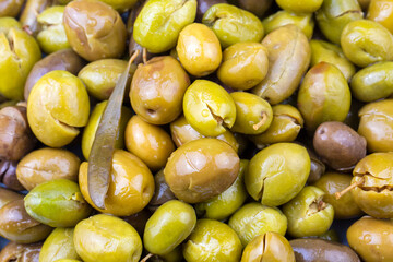 Cracked green olives. Cracked green olives with lemon. Turkish style olive (Turkish name; kirma zeytin)
