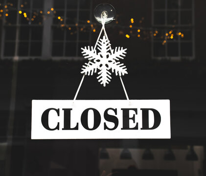 Closed sign hanging on the door.