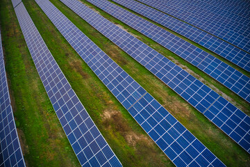 Large solar power plant on a picturesque green field in Ukraine