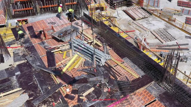 Mega Construction site with work in progress, Top down aerial view.