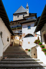 Fototapeta na wymiar Italy, Trentino, Sanctuary of San Romedio - 12 Juli 2020 - View of the sanctuary of San Romedio with its very long staircase