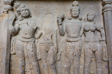 Buddha sculptures on wall at entrance to the largest Kanheri cave at Sanjay Gandhi National Park, Mumbai, India
