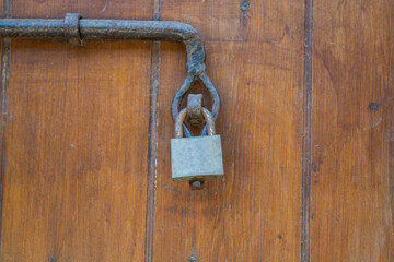 Lock on the wooden door  