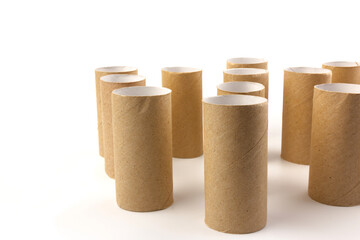 empty paper toilet rolls on white background