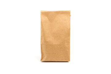 paper disposable bag of brown kraft paper on white background, concept of rejection of plastic packaging, template for designer, packaging for contactless product delivery