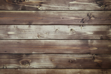 Naklejka premium View on old vintage natural wooden brown board with horizontal lines of planks and knotholes