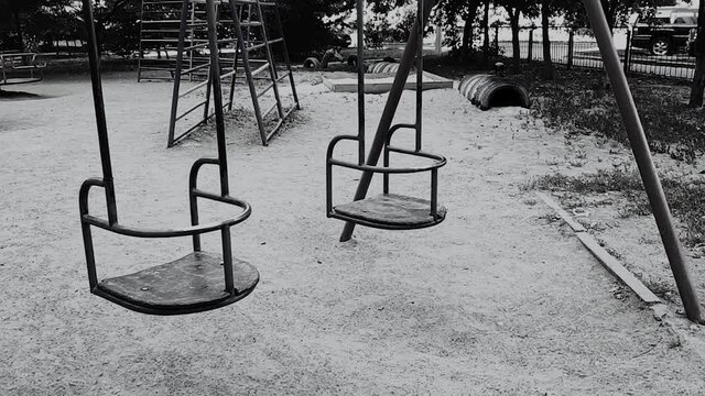 Empty swing video footage background, horror scene clip