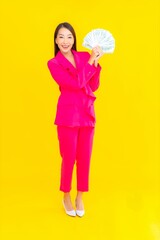 Portrait beautiful young asian woman with a lot of cash or money