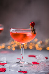 Festive pink cocktail with champagne or prosecco  for St. Valentine's day. Couple of glasses