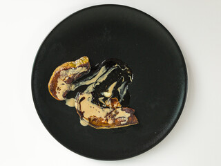 Roasted honey pumpkin with tahini and carob extract on top