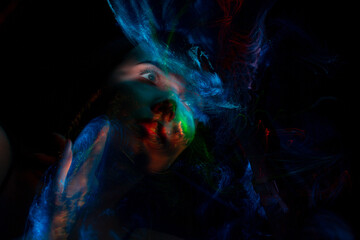 Obraz na płótnie Canvas lightpainting portrait, new art direction, long exposure photo without photoshop, light drawing at long exposure