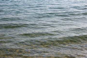 Soft beautiful ocean wave on sandy beach. Background