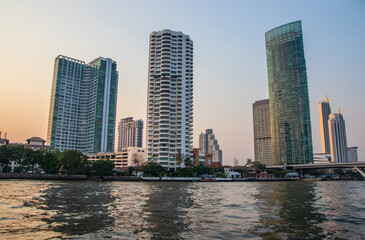 Fototapeta na wymiar Bangkok Thailand Southeast Asia Traveling on the Chao Phraya River as part of an educational tour