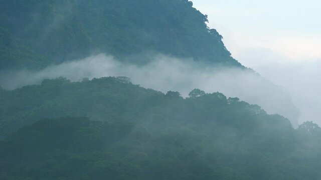 Time-lapse sea of cloud and fog nn the mountains, Waves, Nature, 4K. Cloud and fog drifted slowly across the valley. Hualien, Taiwan.