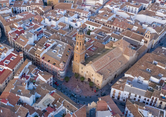 Obraz premium Central square of typical medieval city in South Spain seen from above. Aerial views of the Antequera church
