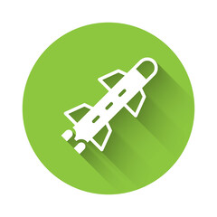 White Rocket icon isolated with long shadow. Green circle button. Vector.