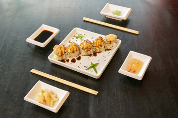 Beautiful and delicious varied sushi rolls on a stone board oporto portugal