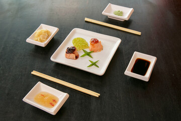 Fototapeta na wymiar Beautiful and delicious varied sushi rolls on a stone board oporto portugal