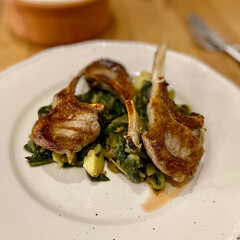 Homemade Lamb Chops with Chard Food Vegetables and Potatoes served in Plate.