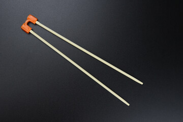 training Wooden chopsticks, sushi sticks on a black background