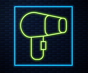 Glowing neon line Hair dryer icon isolated on brick wall background. Hairdryer sign. Hair drying symbol. Blowing hot air. Vector.