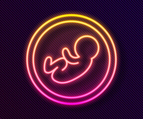 Glowing neon line Baby icon isolated on black background. Vector.