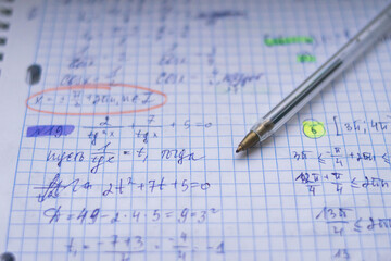 Office. Study. Pen on paper. Formula sheet. Mathematics. Notebook on rings.