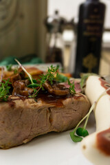 Veal steak with eggplant spinach and potatoes