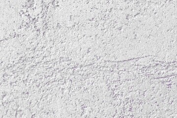 pretty vintage purple travertine like plaster texture for use as background.