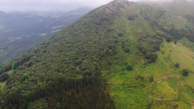  Low clouds around the mountainous massif of Amboto in Urkiola Basque Country
