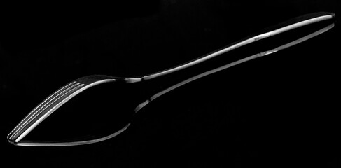 fork isolated on black with reflection