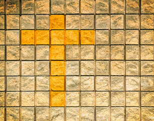 Christian cross in a stone wall