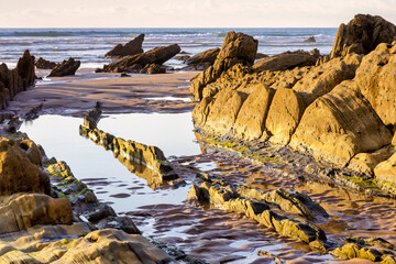 Barrika wild beach at sunset, Biscay, Basque Country, Spain.