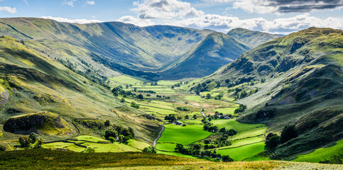 Panorama of Martindale in Cumbria with sunlit valley and hills 6208
