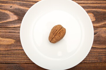walnut open and closed close-up on white background texture worm