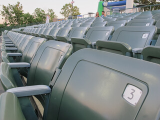 Seats and fans at a baseball ballpark or stadium