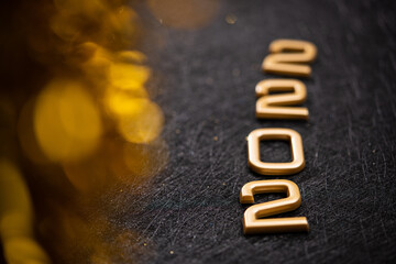 Golden 2022 number on a black background